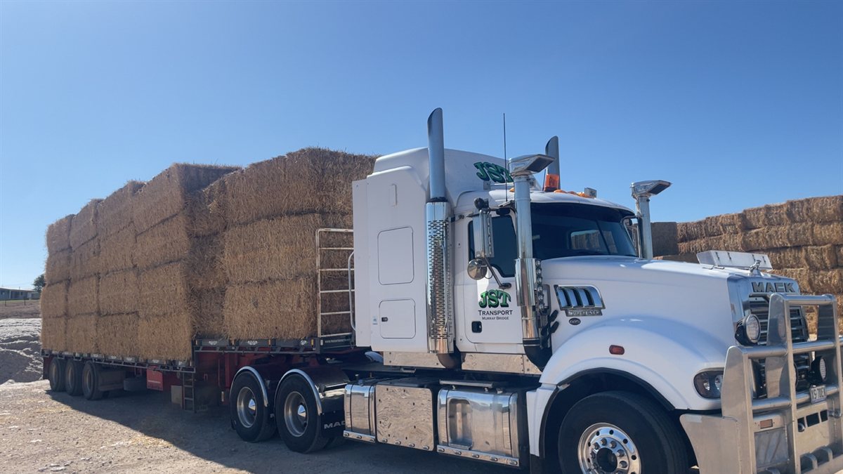 Mack Truck Carting Hay Bales